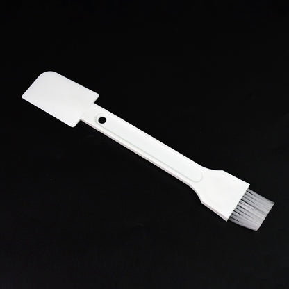 Wukusy multipurpose cleaning scrub brush with handle, ideal for kitchen grooves, slots, and dust removal in home cleaning tasks.