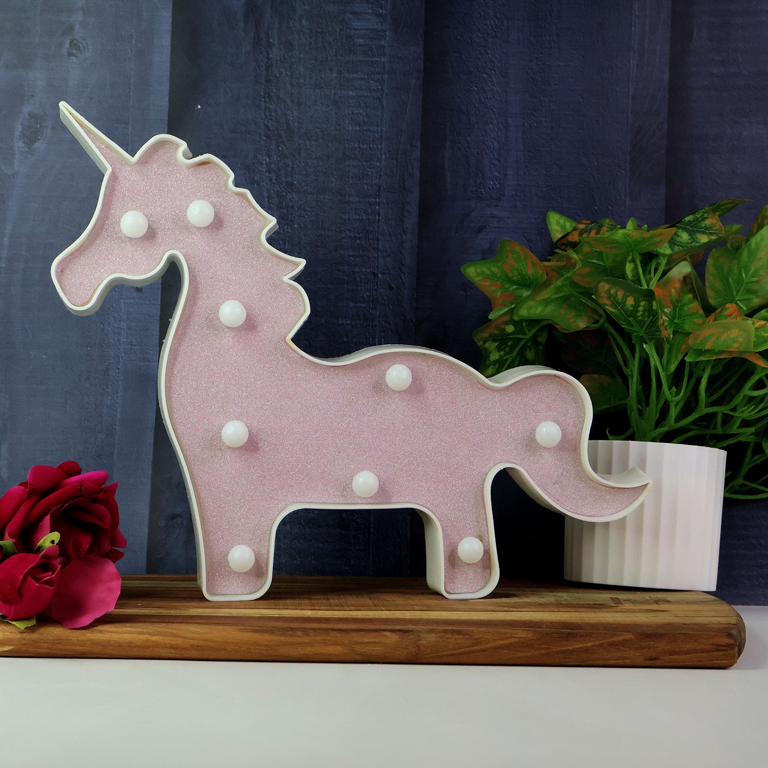 Magical unicorn-shaped LED night light for home decor, featuring a whimsical design and soft glowing light, by Wukusy.