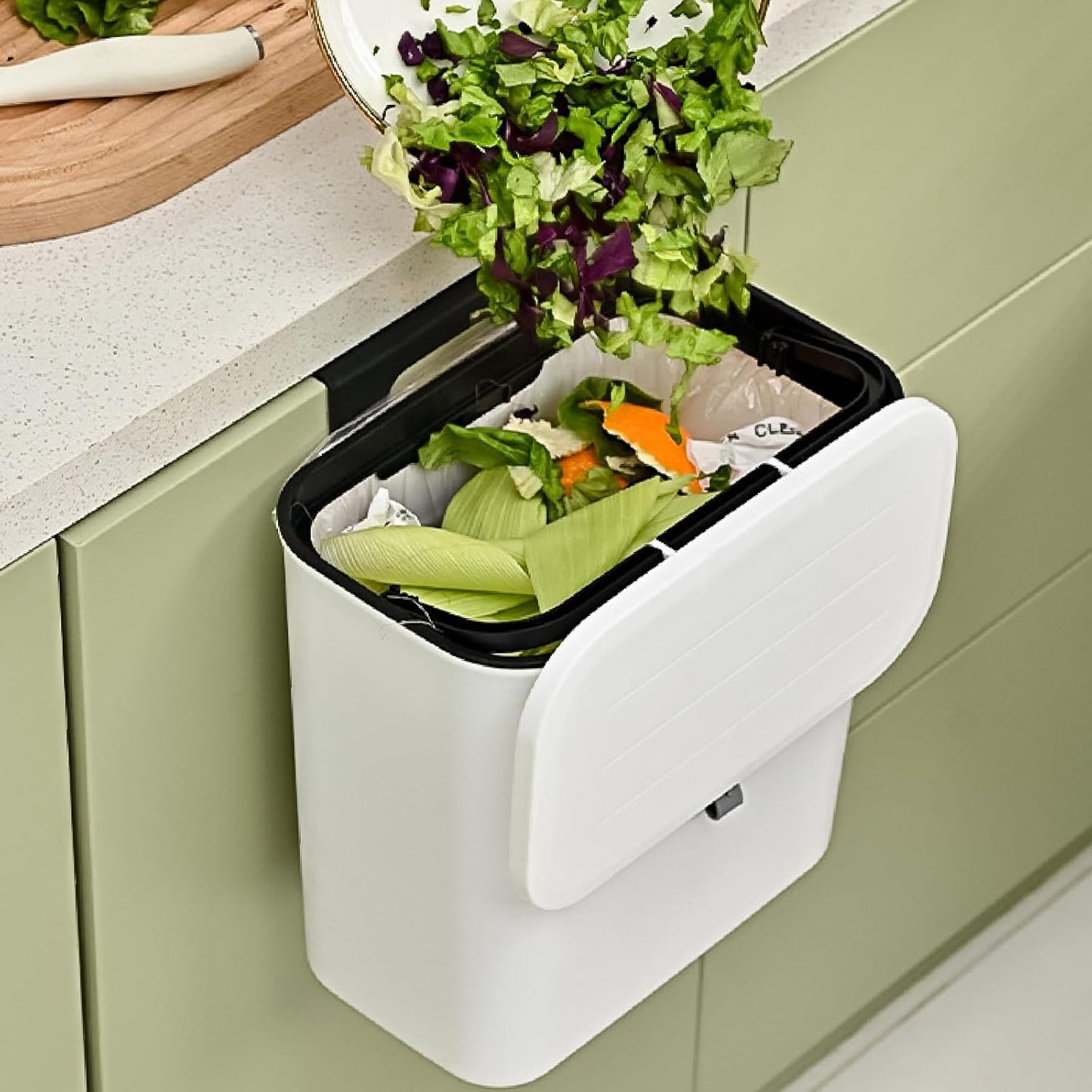 Wukusy portable plastic kitchen dustbin, 25x22 cm, compact trash bin for kitchen use, with a simple design and sturdy construction.