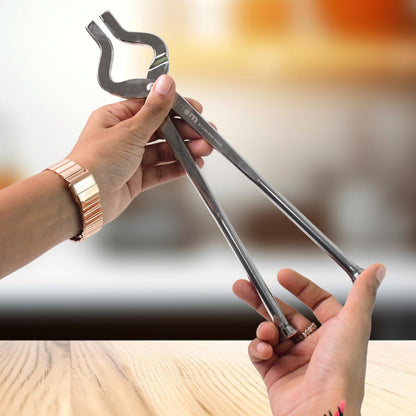 Wukusy Supermom stainless steel full round pincer for kitchen use, featuring a shiny metal finish and ergonomic grip.