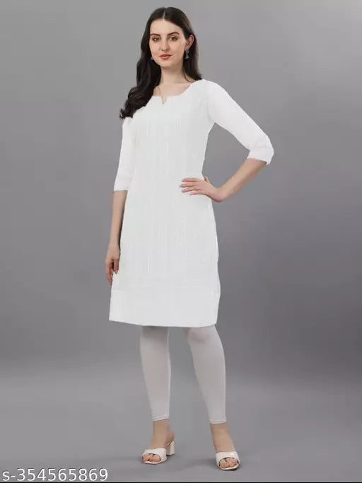 Elegant white women’s chikankari kurta from FIZZI SHOP featuring intricate embroidery and traditional design.