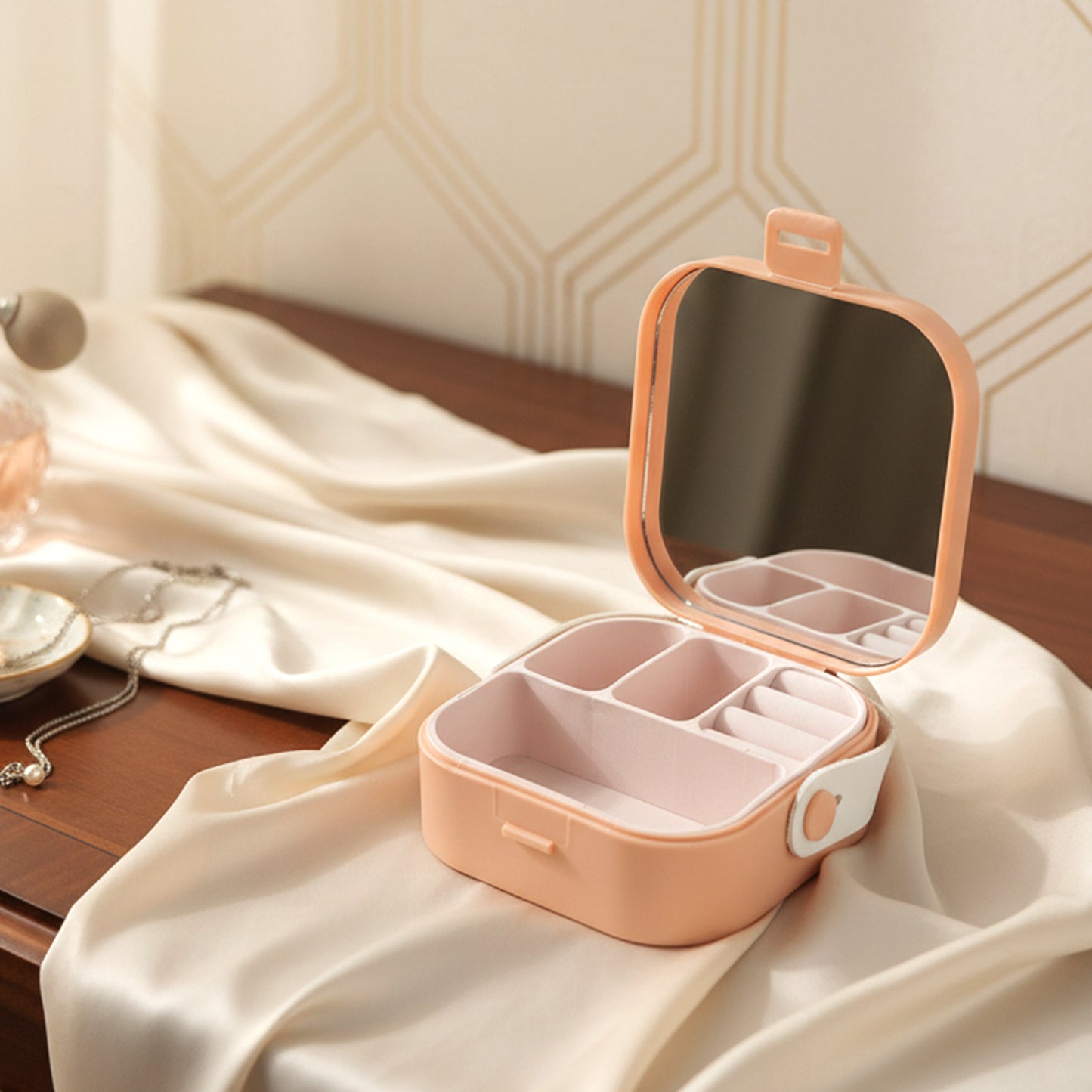 Wukusy portable mini jewelry storage box open with rings and earrings inside, compact organizer for jewelry on the go