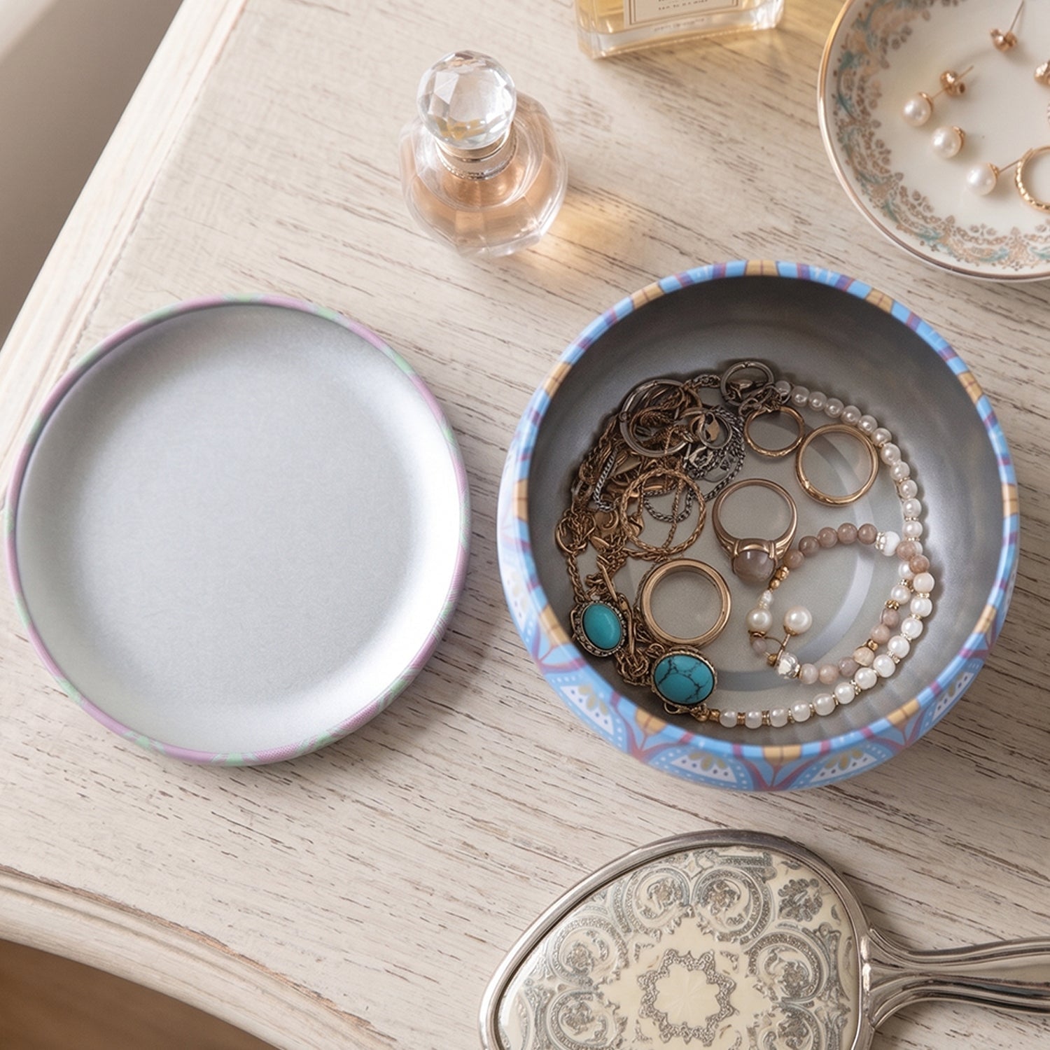 Decorative round metal mandala tin box by Wukusy, perfect for candles or small trinkets, with intricate mandala design.
