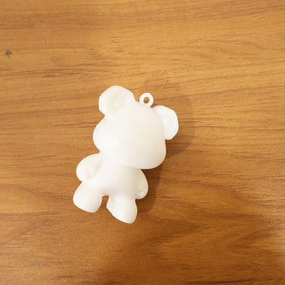 Wukusy cute bear shape mini figure keychain hanging from a keyring, detailed bear design in a compact size.