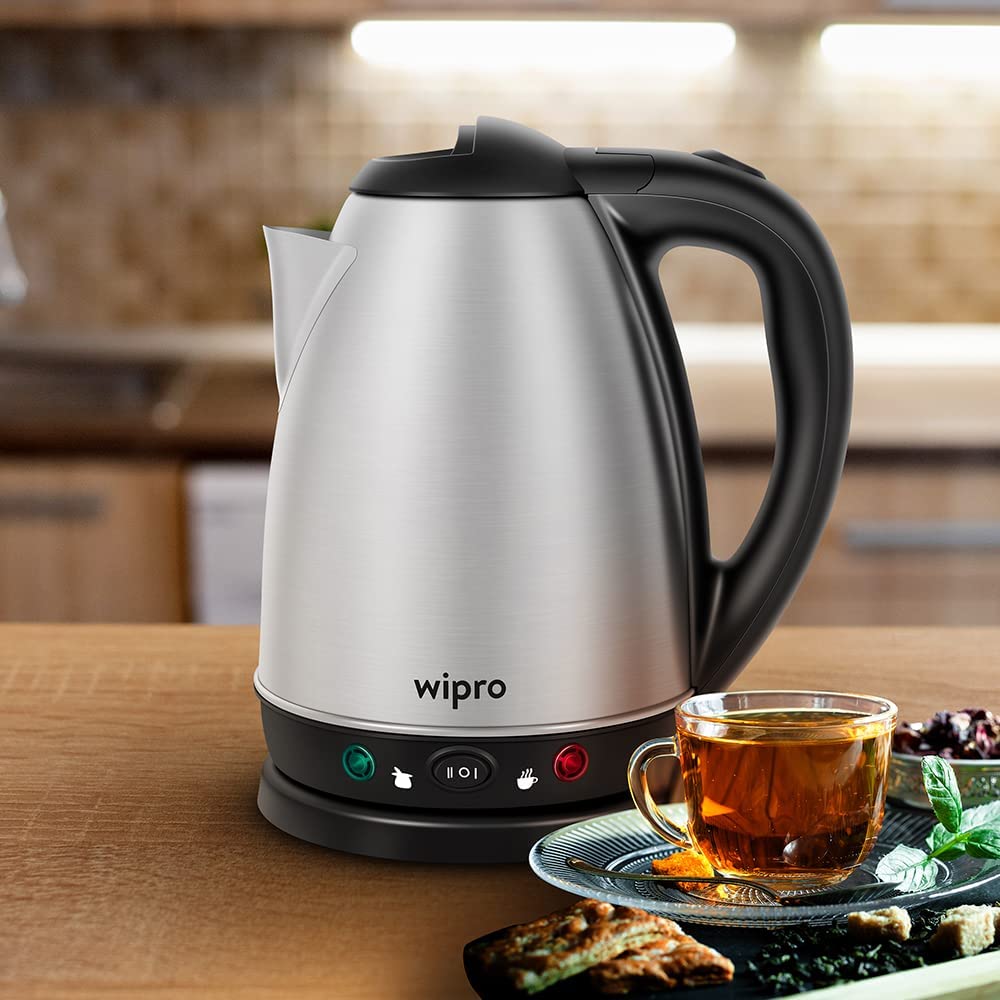 Seasons Wipro Vesta stainless steel kettle with keep warm function and overheat protection, 1.8 L capacity, ready for boiling.