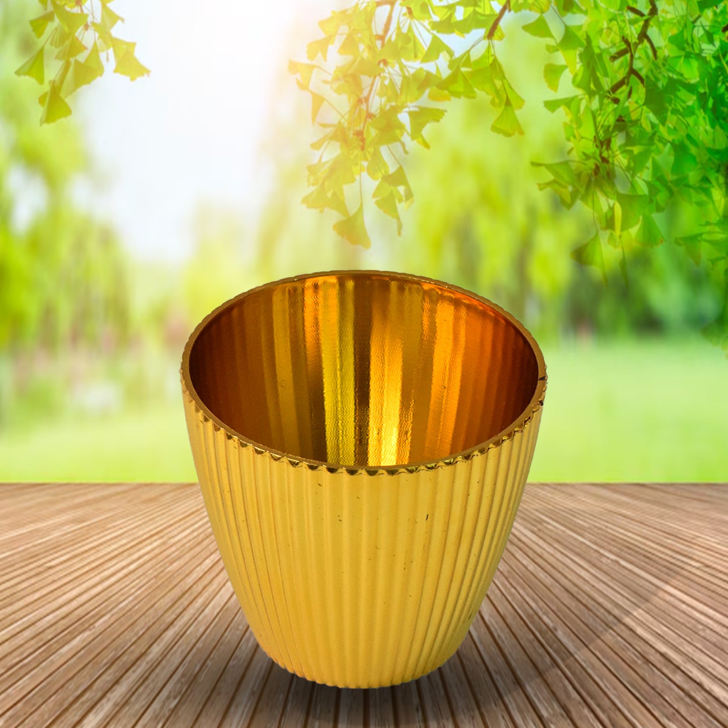 Plastic Flower Valencia in a pot by Wukusy, suitable for home and outdoor decor, with vibrant flower and green leaves.