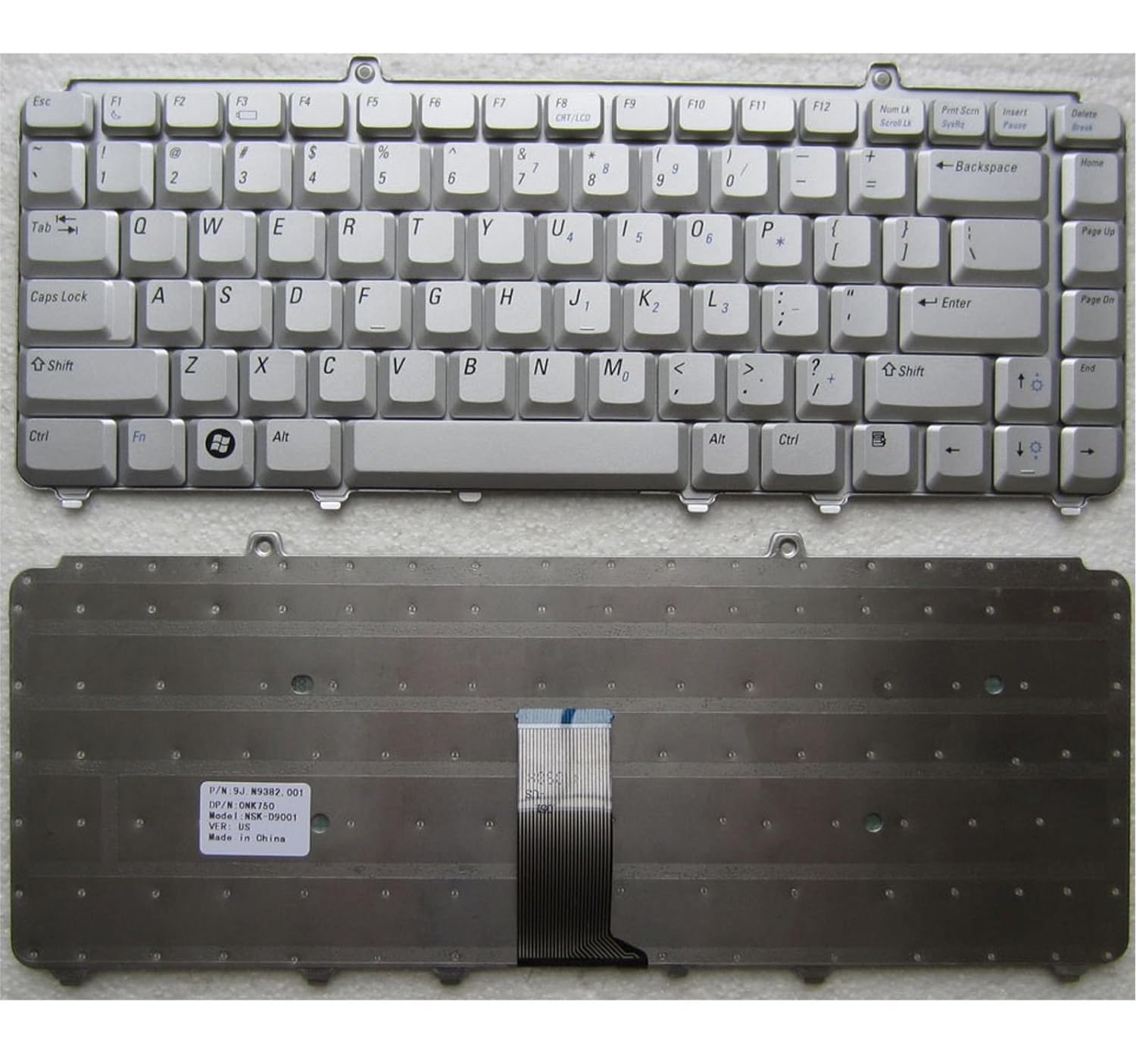 Seasons silver Dell XPS M1330 laptop internal keyboard, full QWERTY layout with function keys, viewed from above.