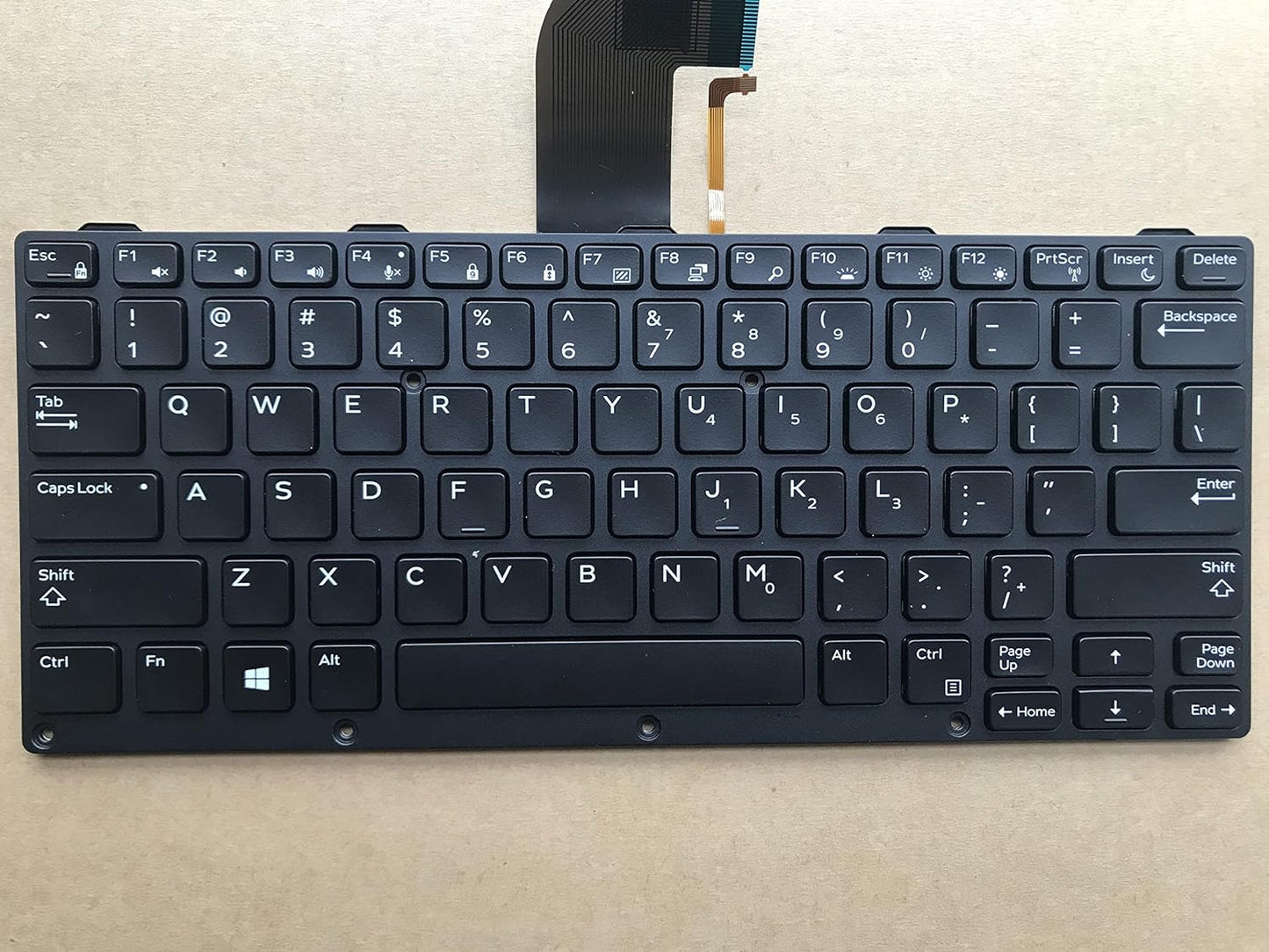 Black Dell Latitude Rugged 7204 internal laptop keyboard by Seasons, backlit with visible keys and internal components.