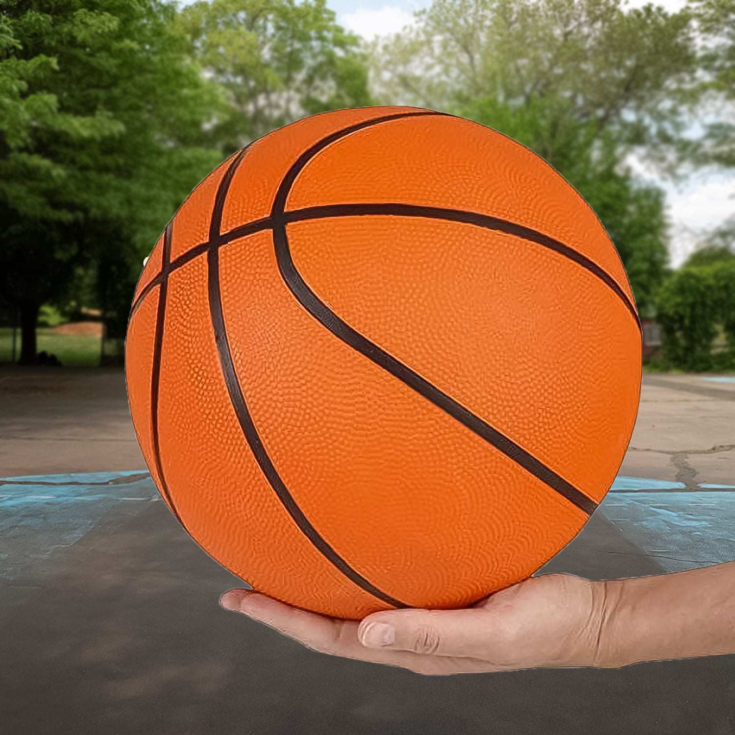 Wukusy mini bouncy basketball toy suitable for sports play, shown bouncing on a colorful court surface.