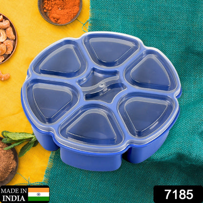 Wukusy 7185 plastic multipurpose masala spice box with 7 sections for kitchen storage, featuring a unique design and easy access.