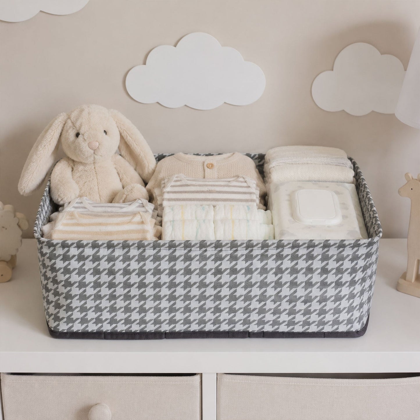 Foldable fabric organizer basket by Wukusy for clothes and toys, showing a soft, lightweight storage box with handles.