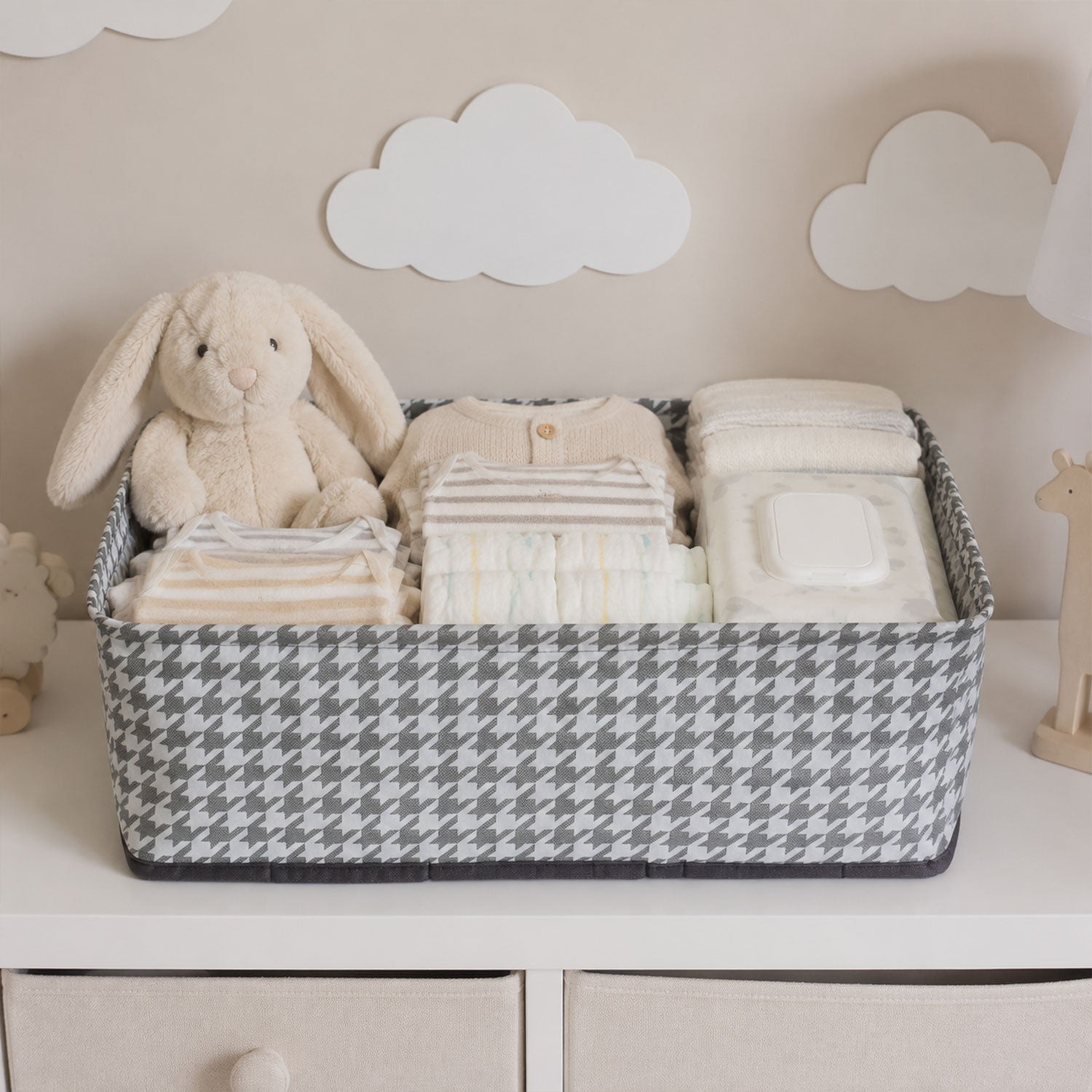 Foldable fabric organizer basket by Wukusy for clothes and toys, showing a soft, lightweight storage box with handles.