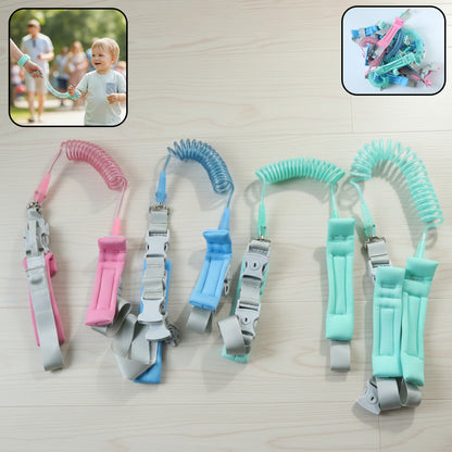 Wukusy Mix Design Baby Safety Walking Leash attached to a young child's hand for safe outdoor walking.