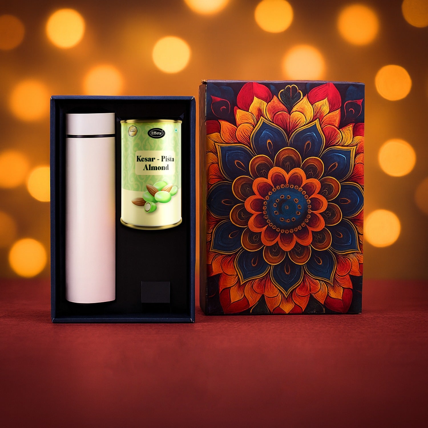 Effete Kesar Pista Almonds gift hamper with golden accents and a bottle, featuring Wukusy home and kitchen product in a 2-piece set.