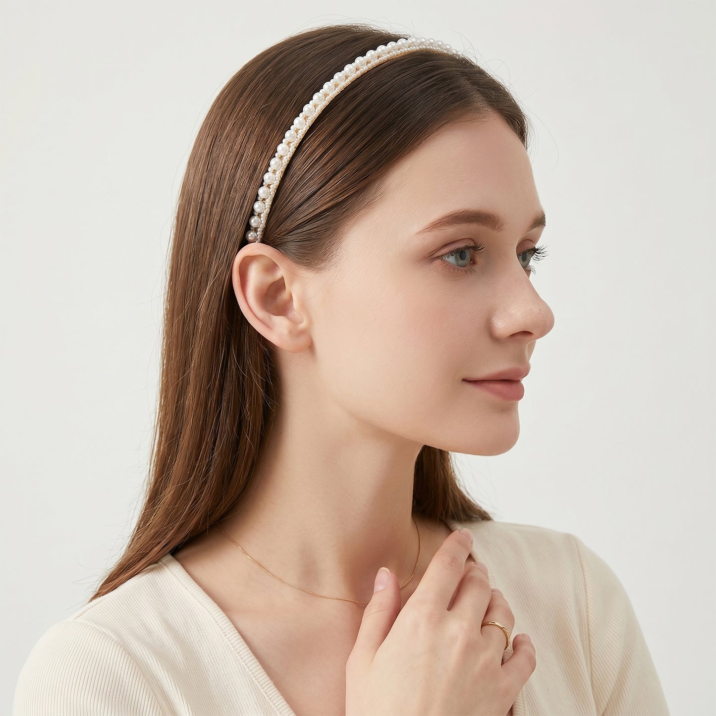 Wukusy premium pearl embellished slim hairband with decorative pearls and sleek design, perfect for elegant hairstyles.