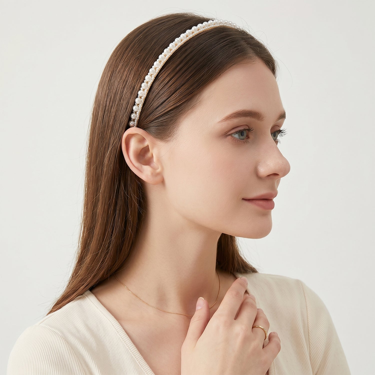 Wukusy premium pearl embellished slim hairband with decorative pearls and sleek design, perfect for elegant hairstyles.