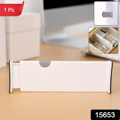 Wukusy expandable drawer divider for home and office, adjustable plastic organizer separating utensils or office supplies in a drawer.