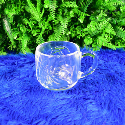 Set of four Wukusy glass tumblers and cups, clear and sleek with smooth surfaces, ideal for drinks and beverages