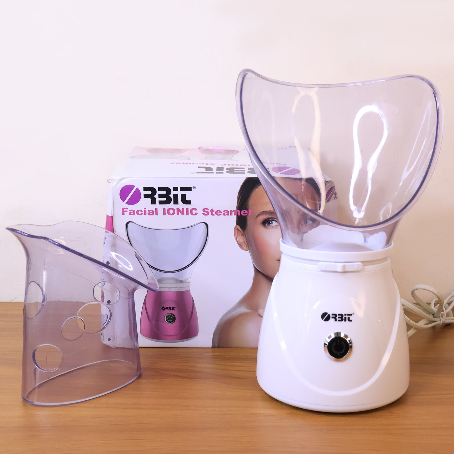 Wukusy Orbit Professional Facial Steamer 130W, health care device with a sleek design and steam outlet for facial skin treatment