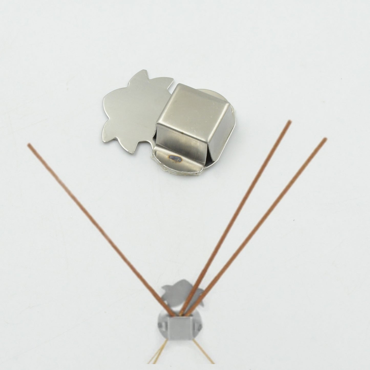 Wukusy stainless steel wall-mounted Agarbatti stand with 3 slots, self-adhesive, pack of 12 hooks for home improvement.