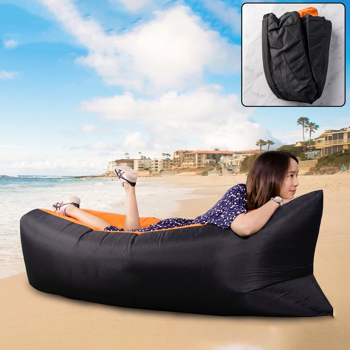 Wukusy inflatable air lounger sofa for pool, beach, and camping, shown fully inflated with blue and gray design on a sandy beach.