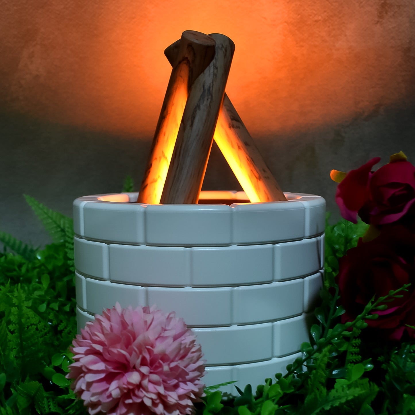 Wukusy bonfire-shaped essential oil diffuser with flame design, multifunction office oil diffuser, emits mist and ambient light.