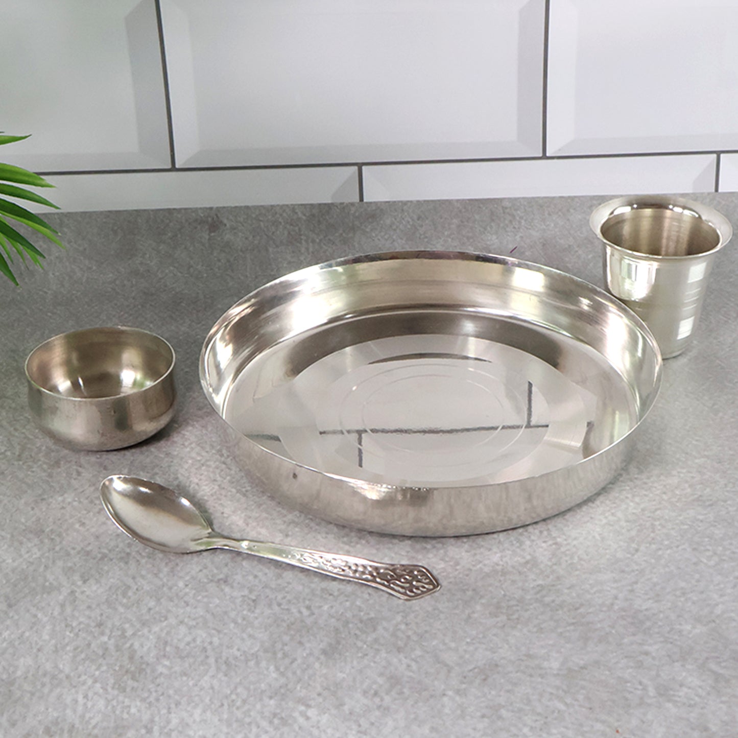 Set of Wukusy stainless steel Pooja Thali with traditional design, perfect for religious rituals and home prayer ceremonies.