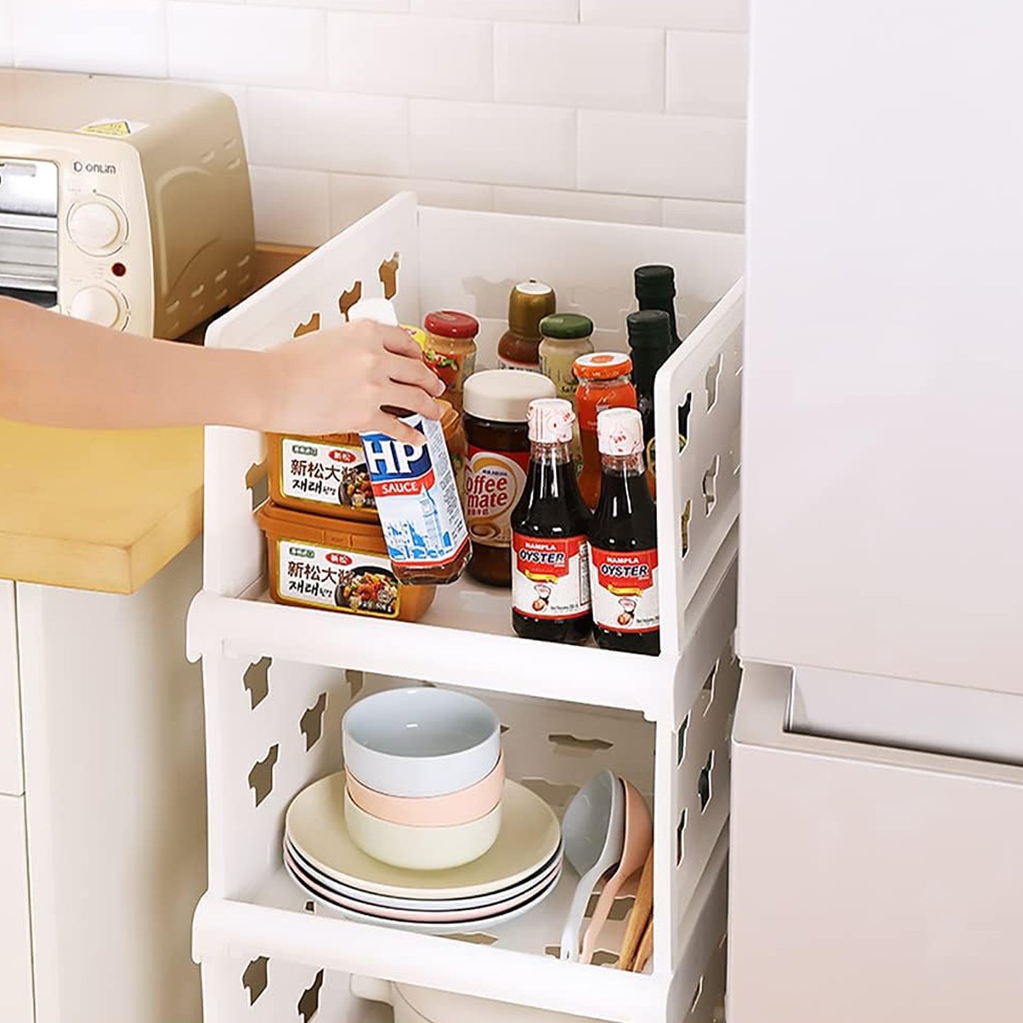 Wukusy 4-layer stackable multifunctional storage cart with drawers, ideal for clothes, pantry, or bathroom organization.