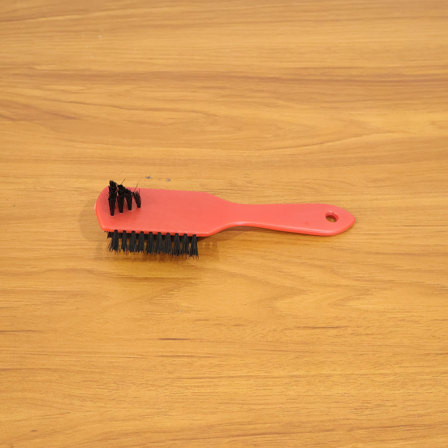 Wukusy multipurpose shoe cleaning brush with wooden handle and bristles for scrubbing shoes and sneakers.