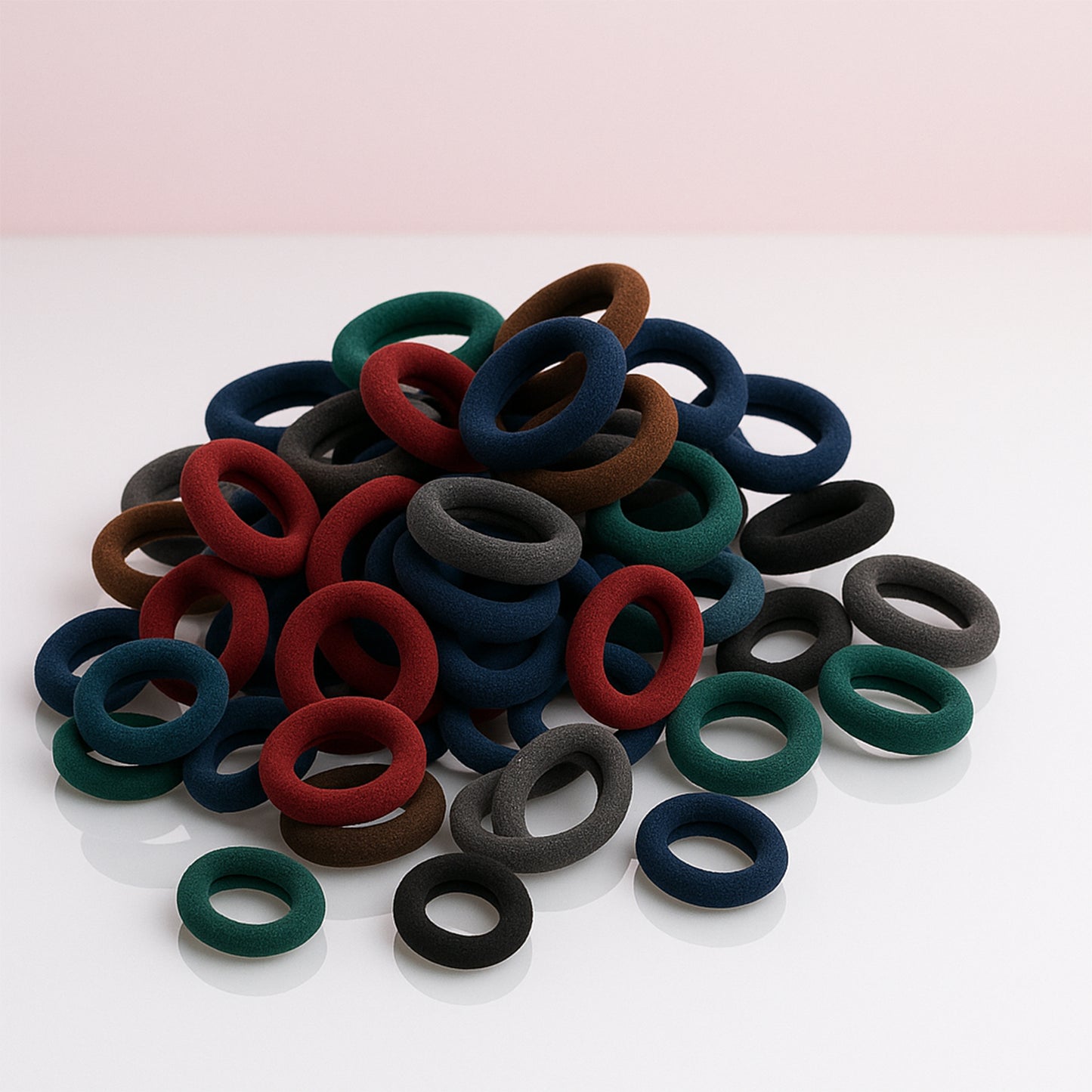 Multicolored Wukusy small hairbands for hair, rubber bands pack of 50, ideal for styling and securing hair.