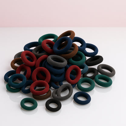 Multicolored Wukusy small hairbands for hair, rubber bands pack of 50, ideal for styling and securing hair.