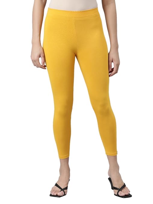 Stretchable skinny fit high ankle length leggings by FIZZI SHOP, showcasing a sleek, form-fitting design in a solid color.