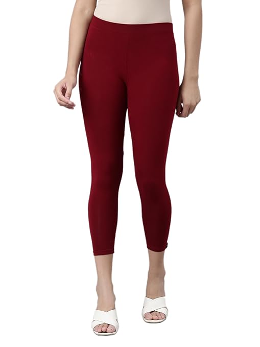 Maroon skinny fit high ankle length leggings from FIZZI SHOP, close-up of stretchy fabric and fitted design.