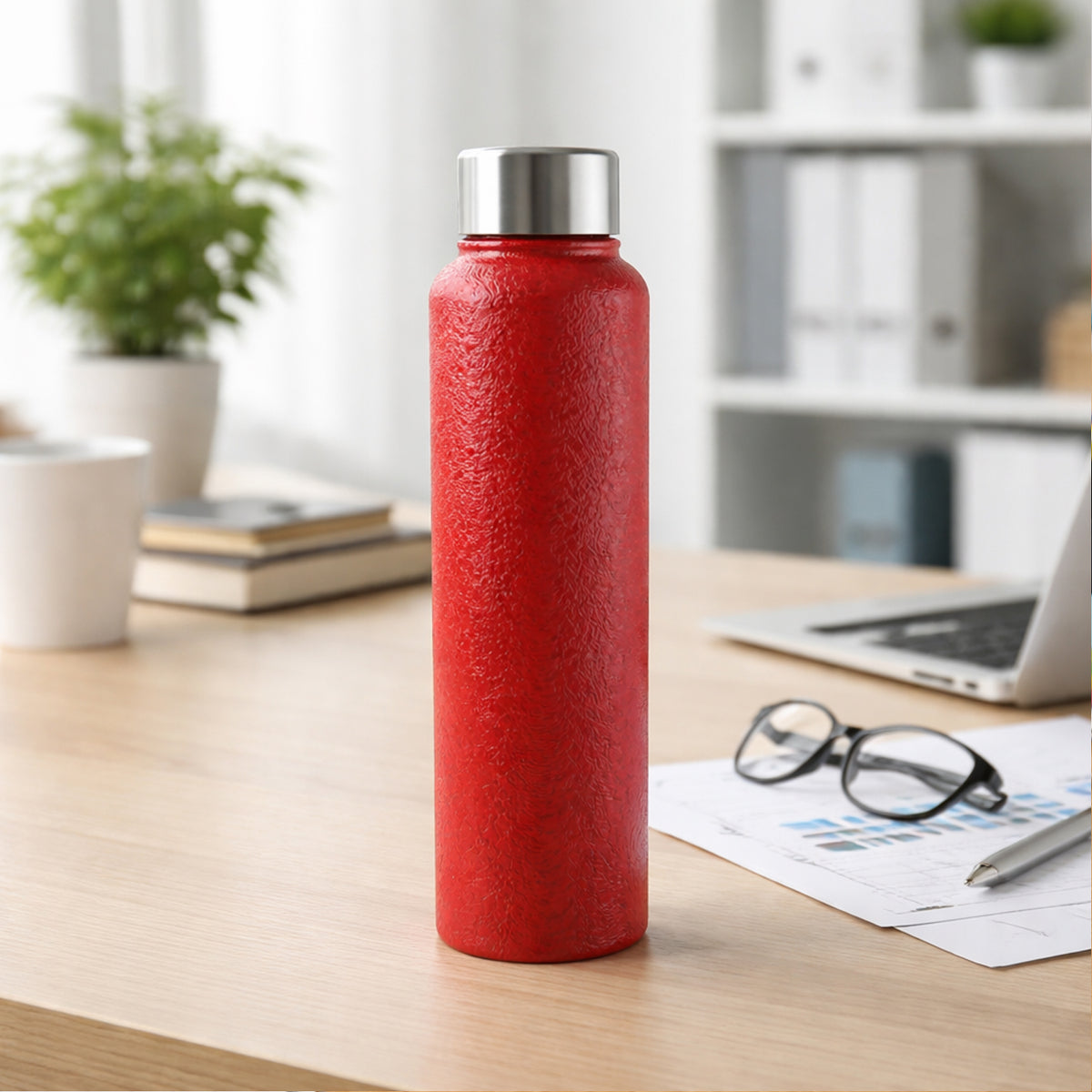 Red 1000ml stainless steel water bottle from Wukusy, featuring a sleek design for durable, reusable hydration.