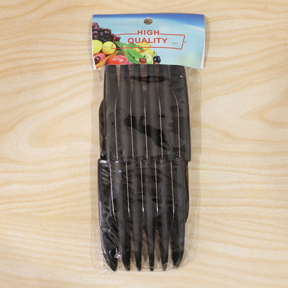Wukusy 12-piece kitchen knife set with stainless steel blades and ergonomic handles on a wooden countertop.
