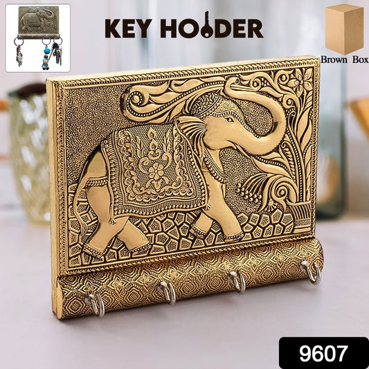 Wukusy wooden key holder with gold antique elephant design, stylish home decor accessory, wall-mounted with hooks for keys.