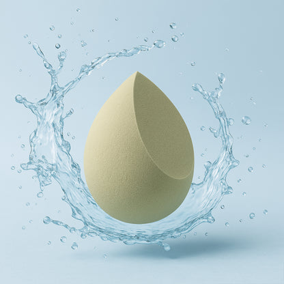 Multicolor Wukusy makeup sponge for blending liquid foundations, powders, and creams, showing its soft, rounded surface.