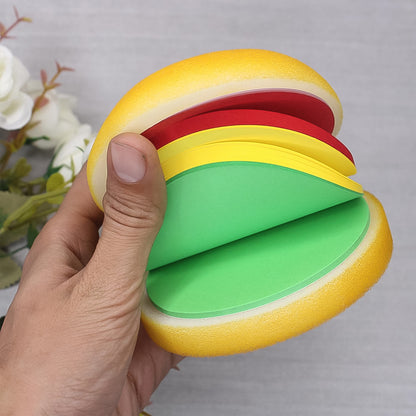 Multicolor burger-shaped notepad by Wukusy featuring sticky notes and mini memo pads for office organization.