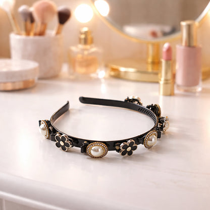 Elegant pearl floral designer hairband for women and girls with pearl accents and floral details by Wukusy.