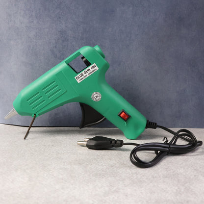 Wukusy 575 40 Watt glue gun for electronics, with ergonomic handle and cord, ready for precise adhesive application.