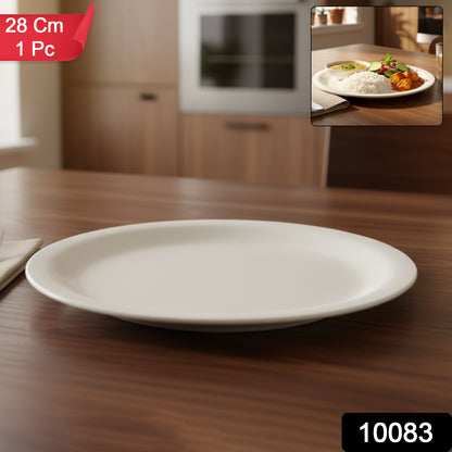Round dinner plate by Wukusy, 28cm ceramic plate for home and kitchen use, white and glossy, displayed on a dining table.