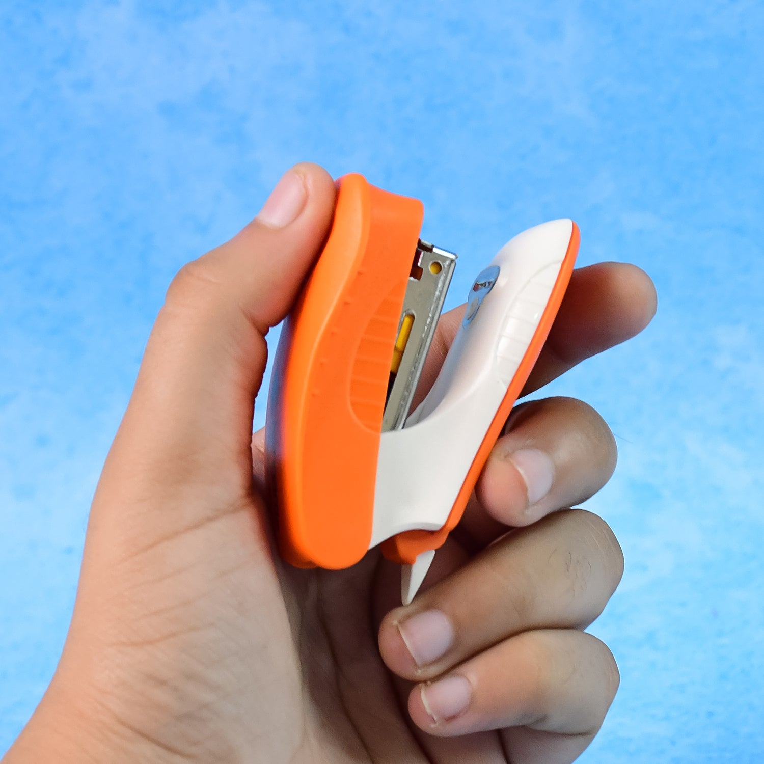 Wukusy Kangaro 5-in-1 stationery gift set with stapler, staples, staple remover, and tape dispenser on a white background.