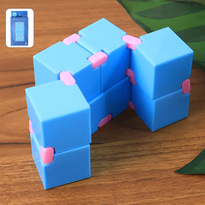 Wukusy infinity cube fidget toy, stress relief hand puzzle for kids and adults, compact sensory toy in black and silver.