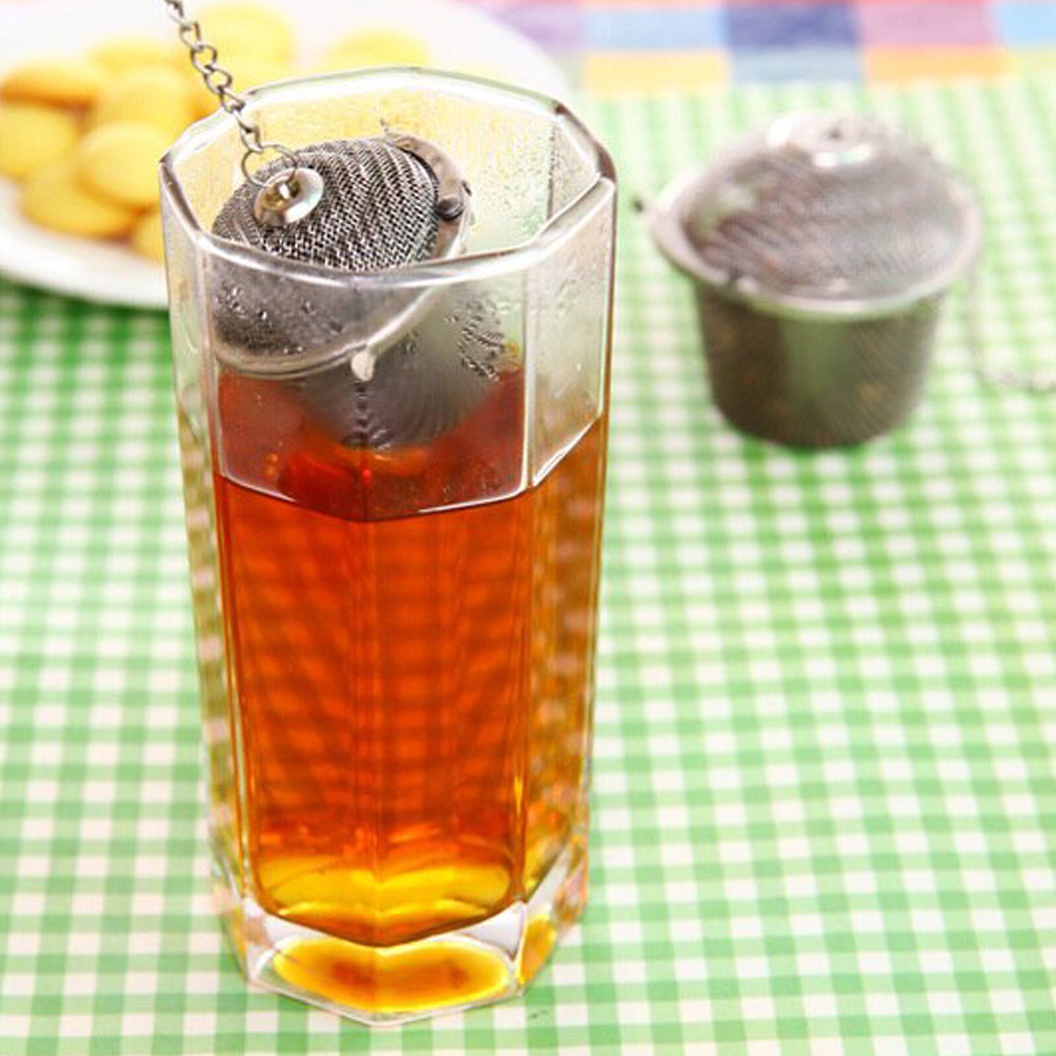 Wukusy 2744 Ss Easy Tea Filter, stainless steel kitchen tool for filtering tea in household and office kitchen setups.