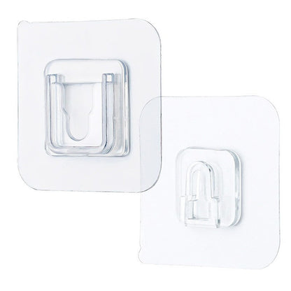 Wukusy 7433 transparent adhesive male hook for hanging items, shown attached to a wall in a home improvement setting