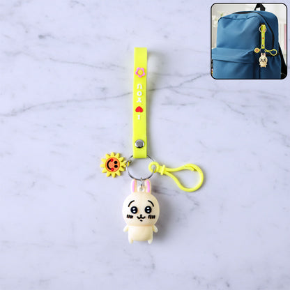 Cute cartoon bunny silicone keychain with decorative strap by Wukusy, featuring a adorable bunny design and vibrant colors.