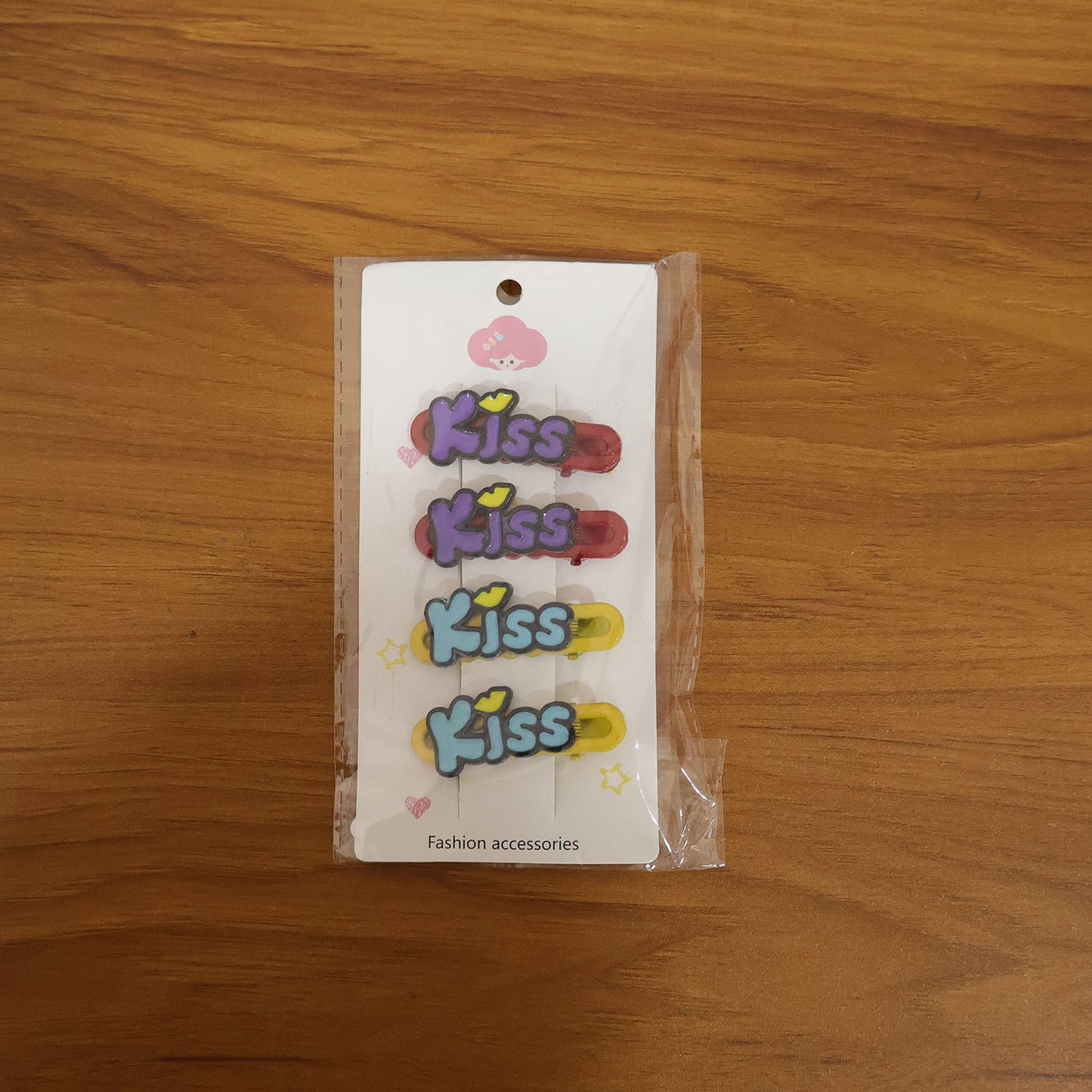 Wukusy decorative kiss text hair clip set with four fashionable hair accessories featuring kiss and text designs.