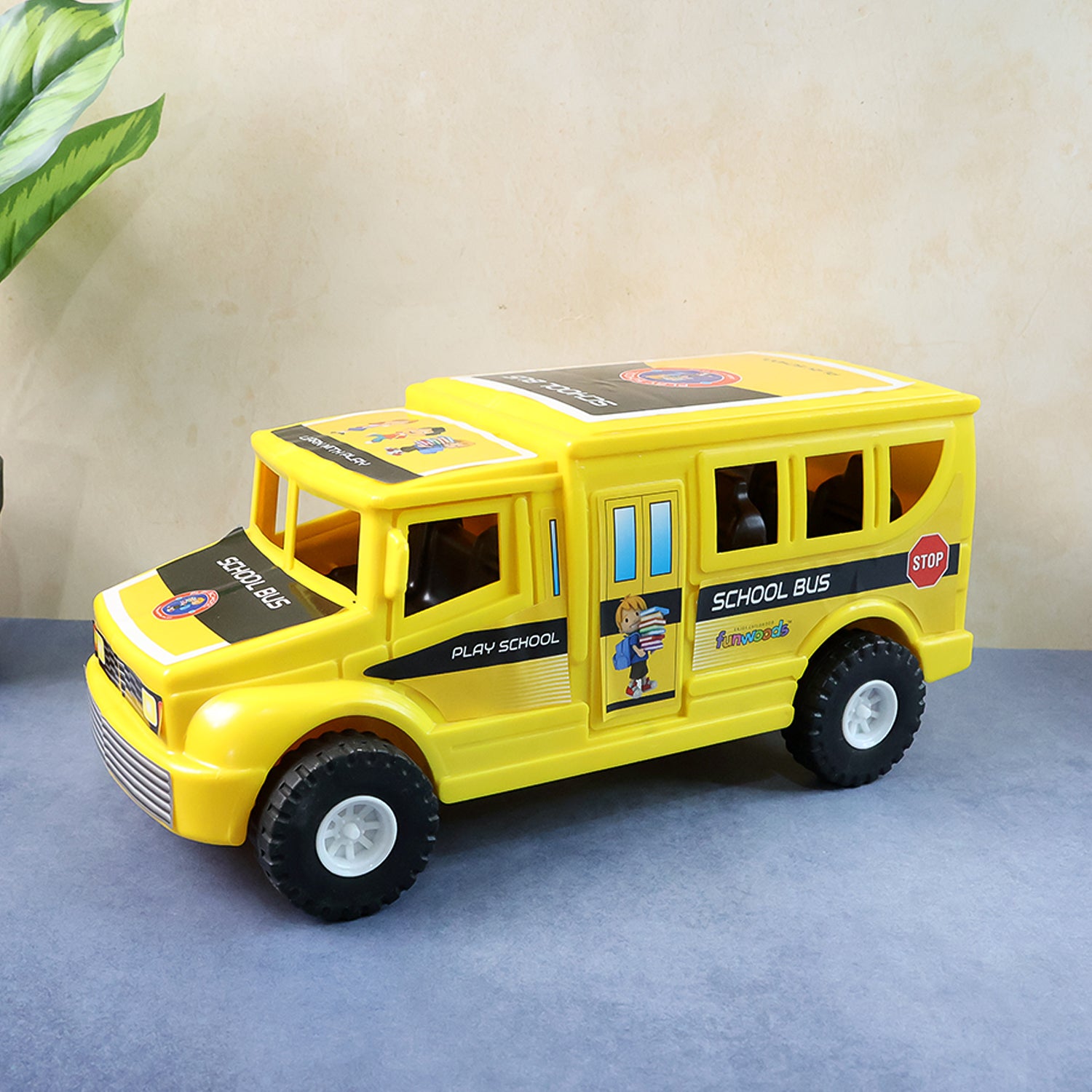 Wukusy Funwoods friction-powered school bus toy with bright yellow body and black wheels, designed for children’s play.