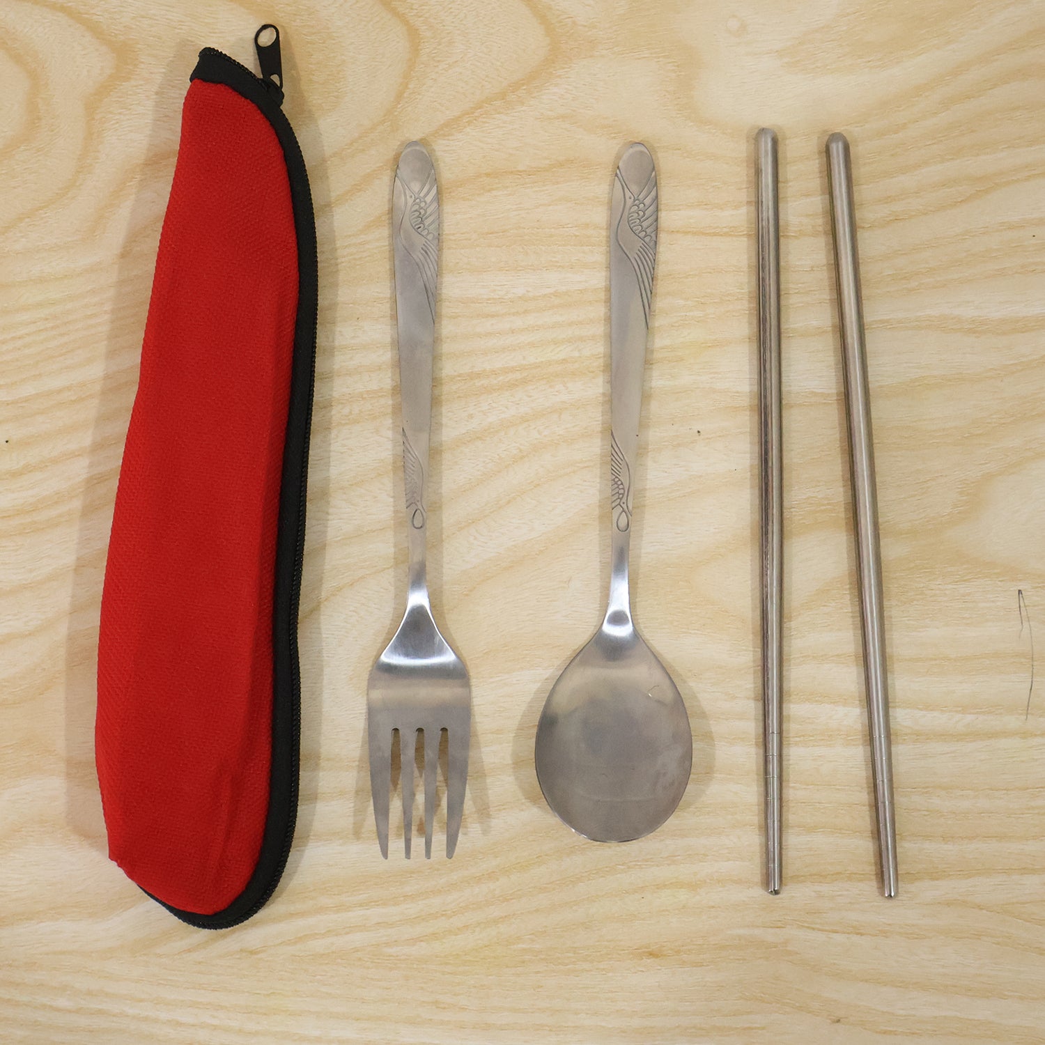 Wukusy portable stainless steel cutlery set with fork, spoon, chopsticks, and pouch, perfect for travel and outdoor use