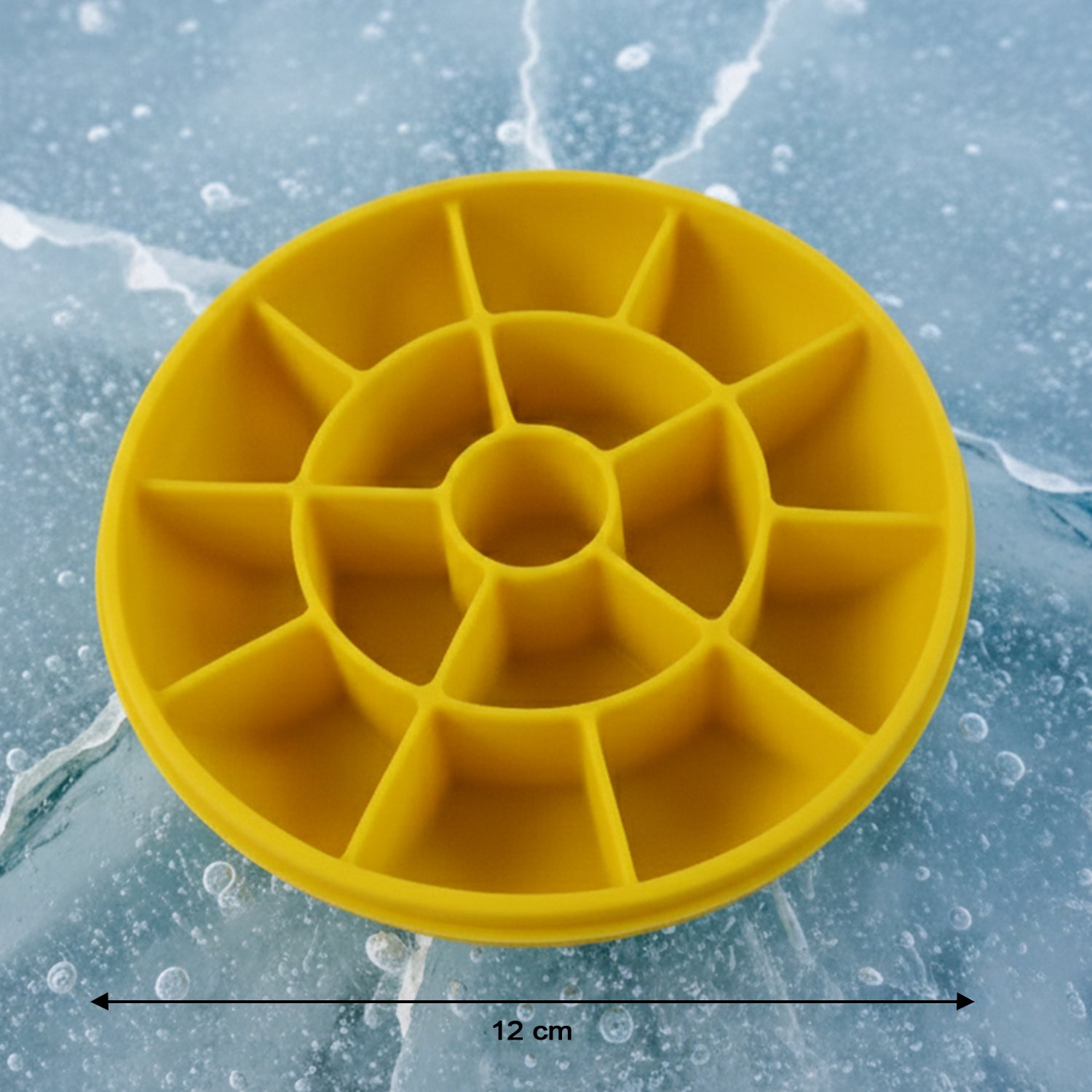 Wukusy premium round ice cube tray with lid, showing a tray filled with clear ice cubes ready for freezing in a modern kitchen setting.